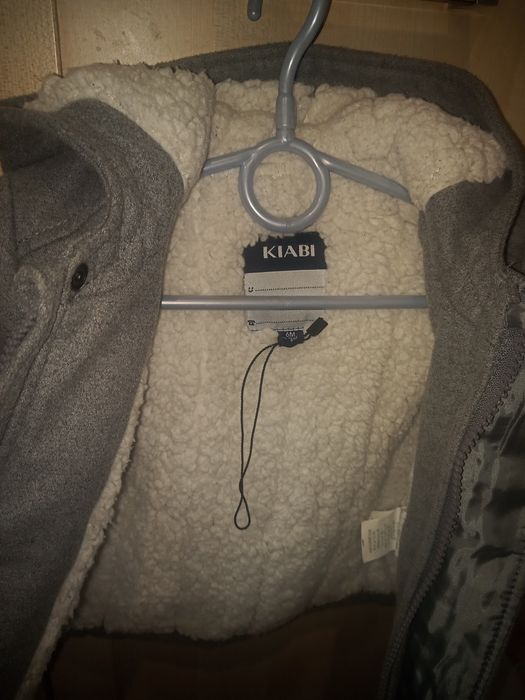 Kombinezon, kurteczka jesionka .cena za komplet