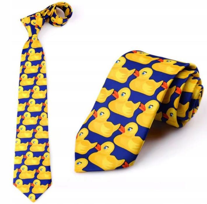 Nowy krawat męski 145 x 8 niebieski żółte kaczki
