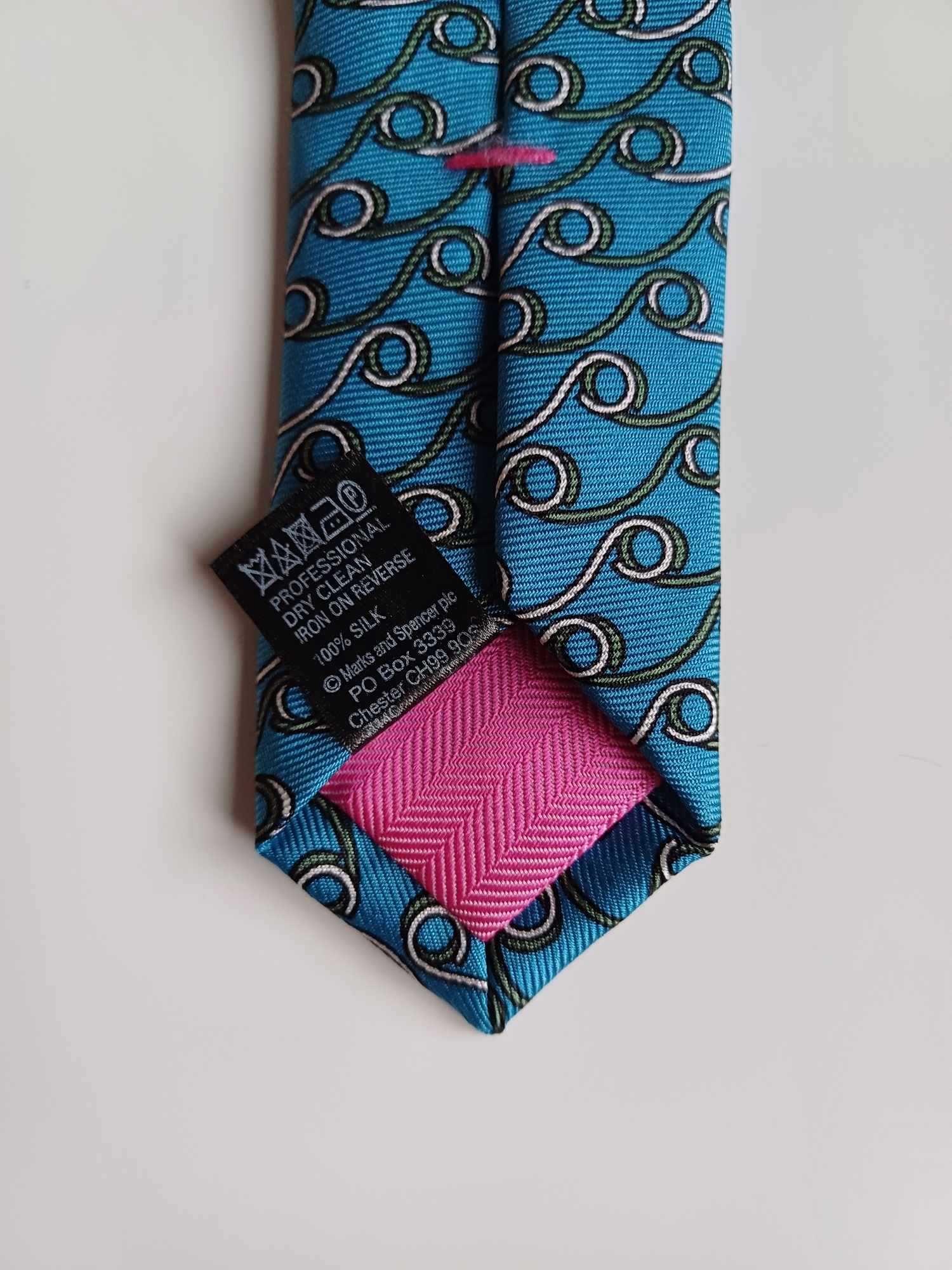 Niebieski jedwabny krawat w ciekawy wzór