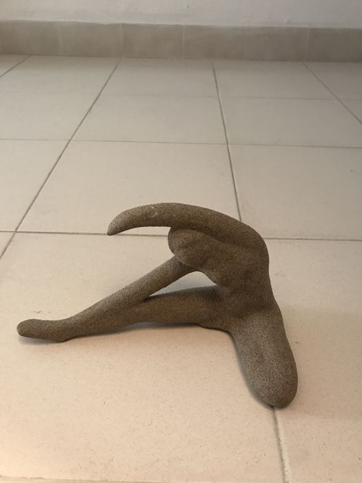 Peça decorativa boneca sentada