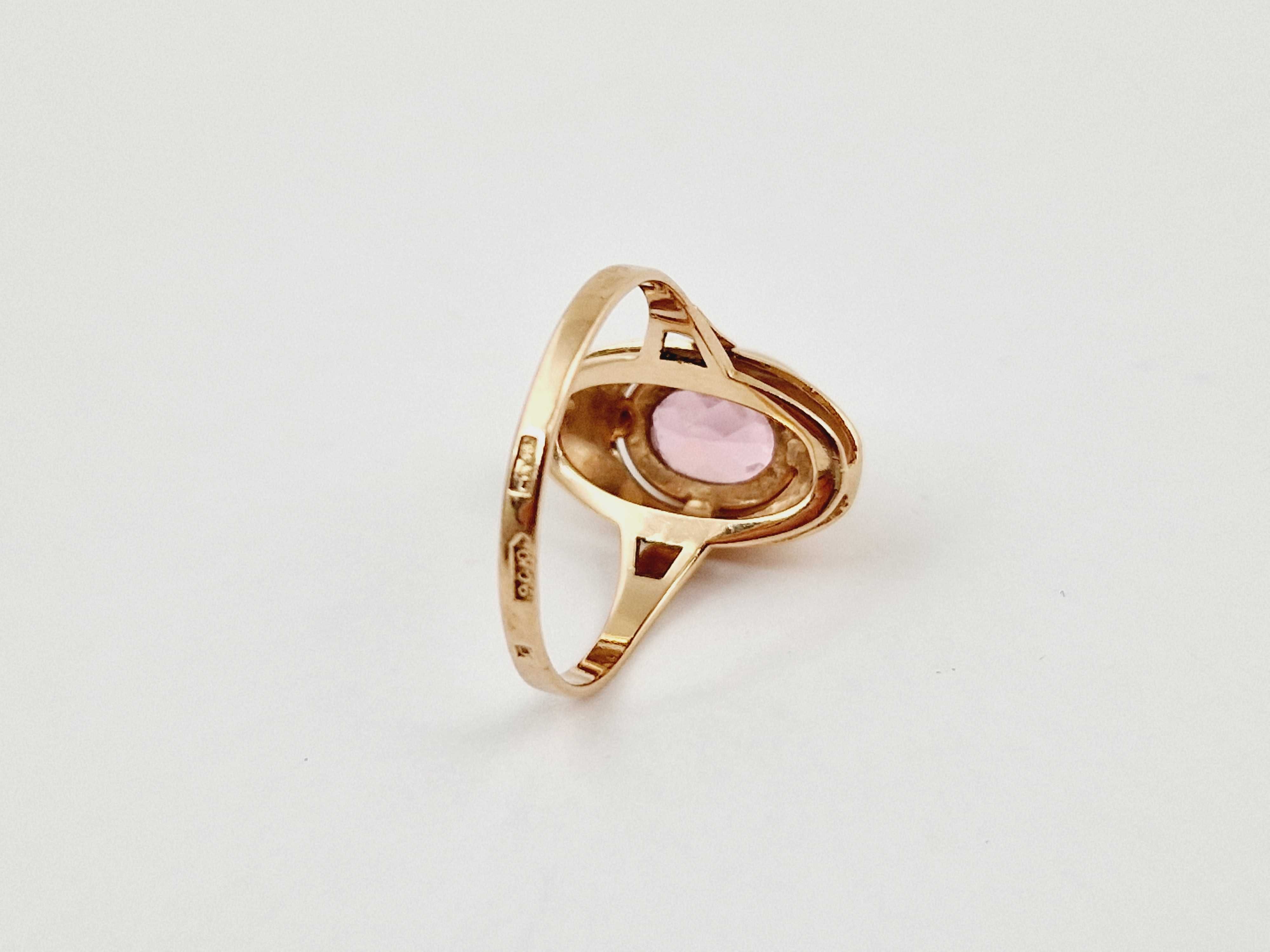 Złoty pierścionek z różowym oczkiem 3,99g/14k r.18