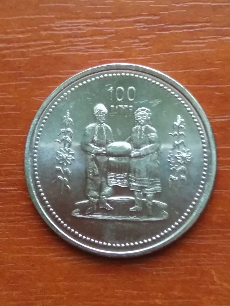 Монета 100 ліття Українців в Канаді