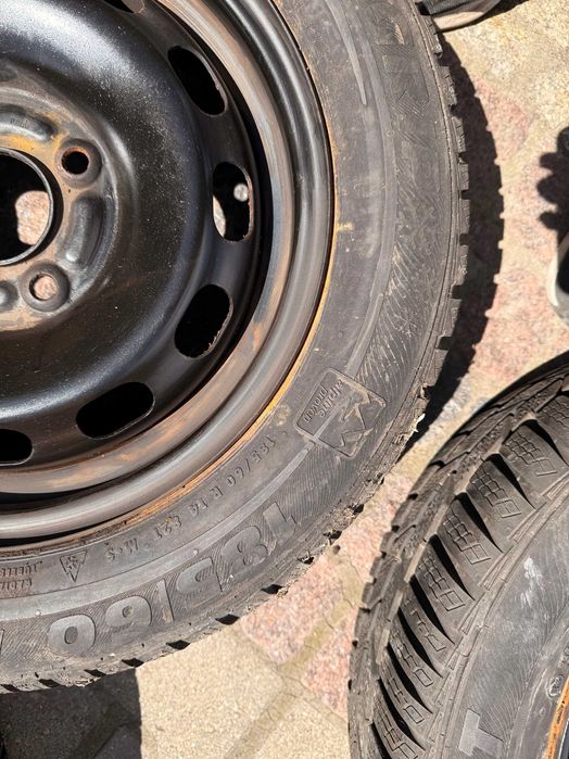 Koła zimowe 14 Ford Fiesta mk5 mk6 Focus I + 185/60R14 Semperit