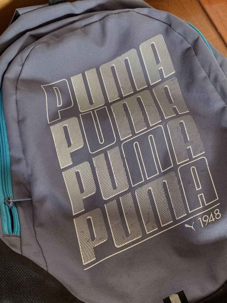 Mochila puma cinzenta