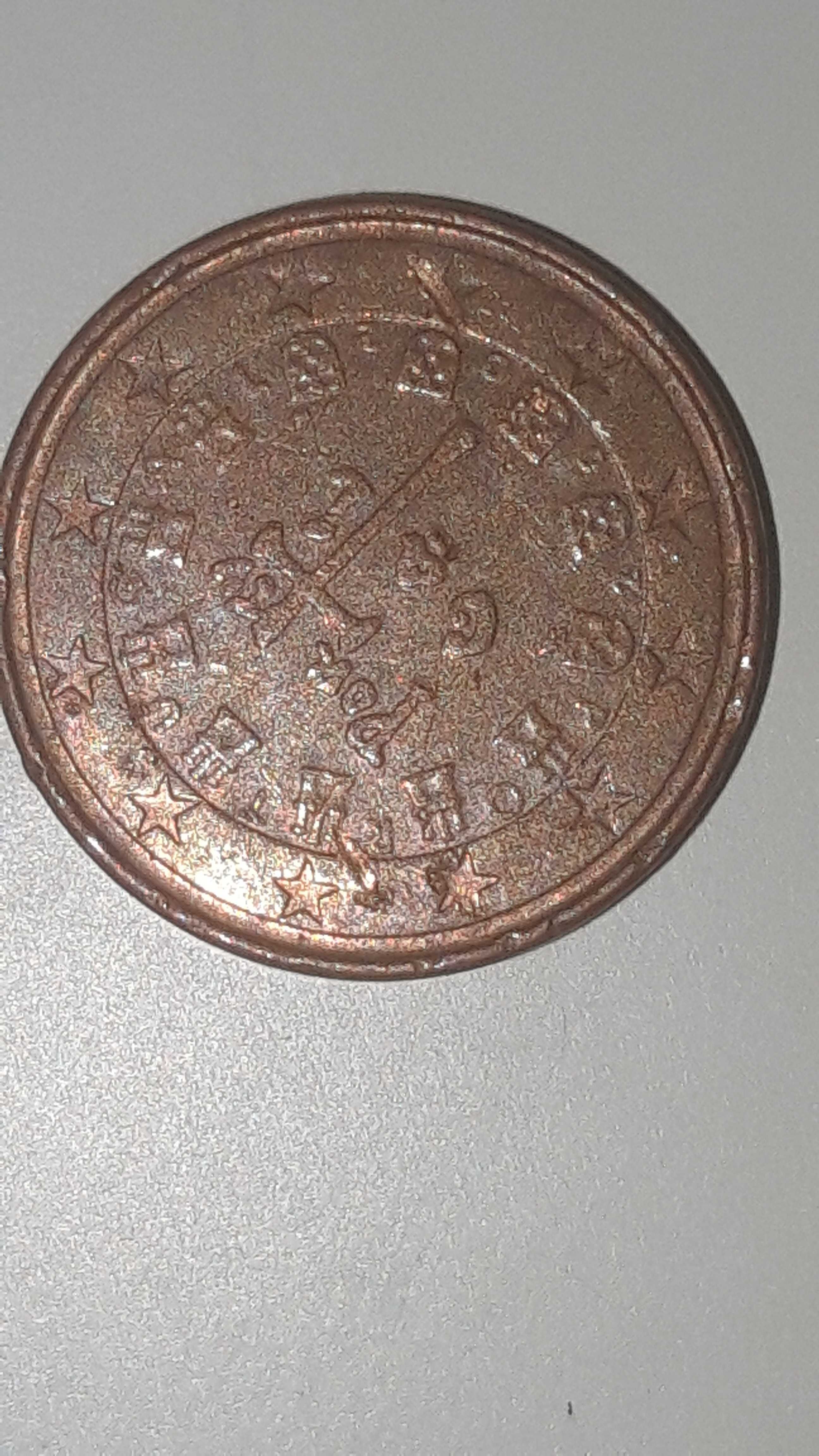 3 moedas de 1 centimo com defeito.