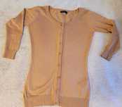 Camel sweterek Mohito s
Kolor biały 
Rozmiar z metki 9-10l/140cm,al