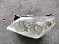 Farol esquerdo Opel astra h