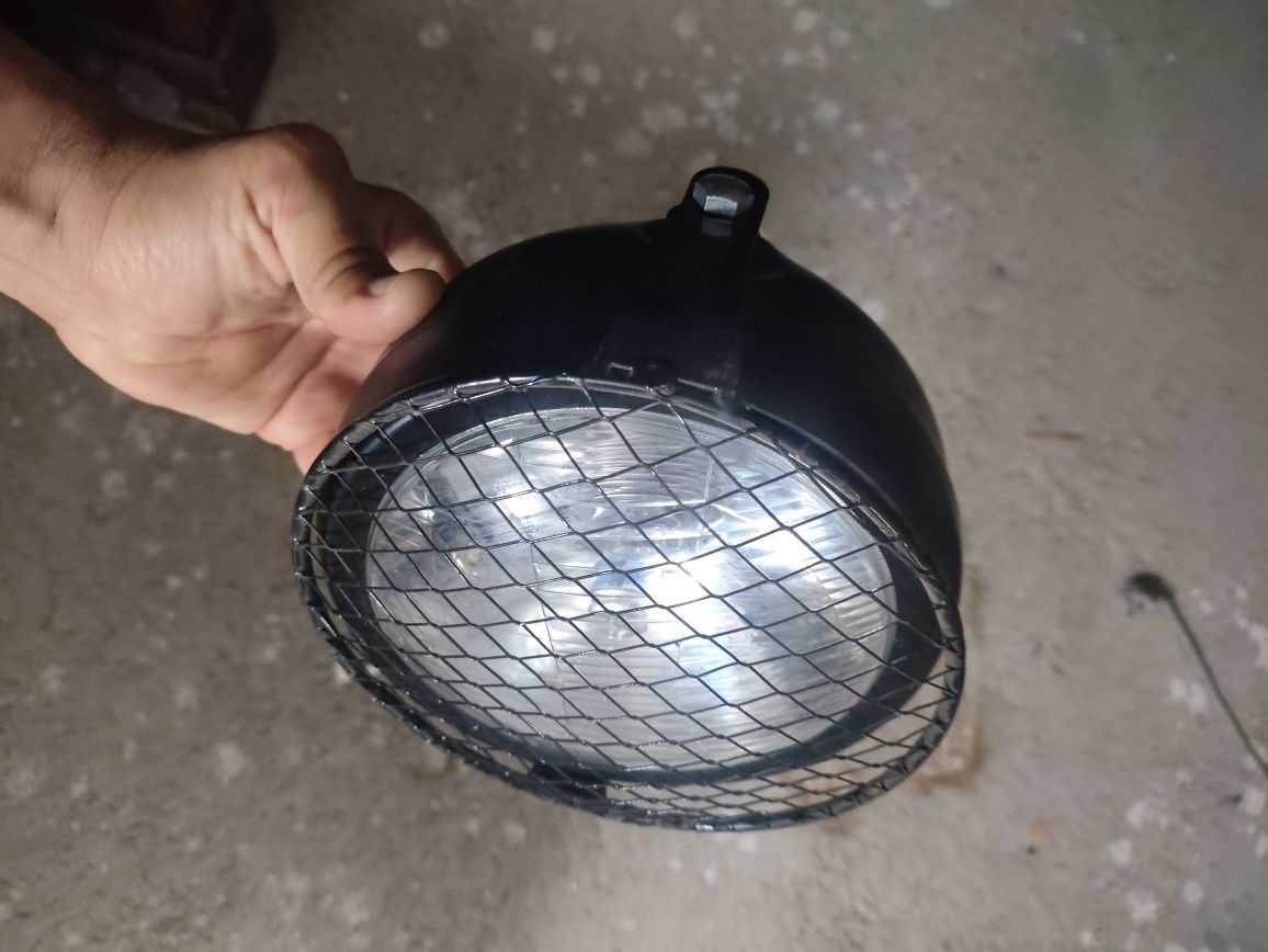 Farol grelha proteção