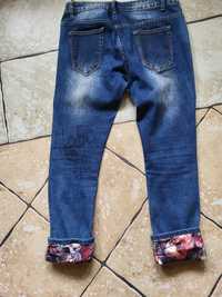 Spodnie dżinsowe L z ozdobnymi mankietami