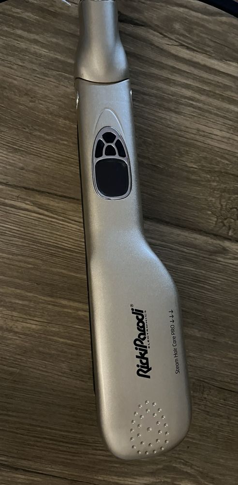 Escova a vapor como nova