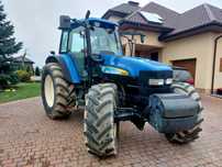 New holland TM 140  rok 2002