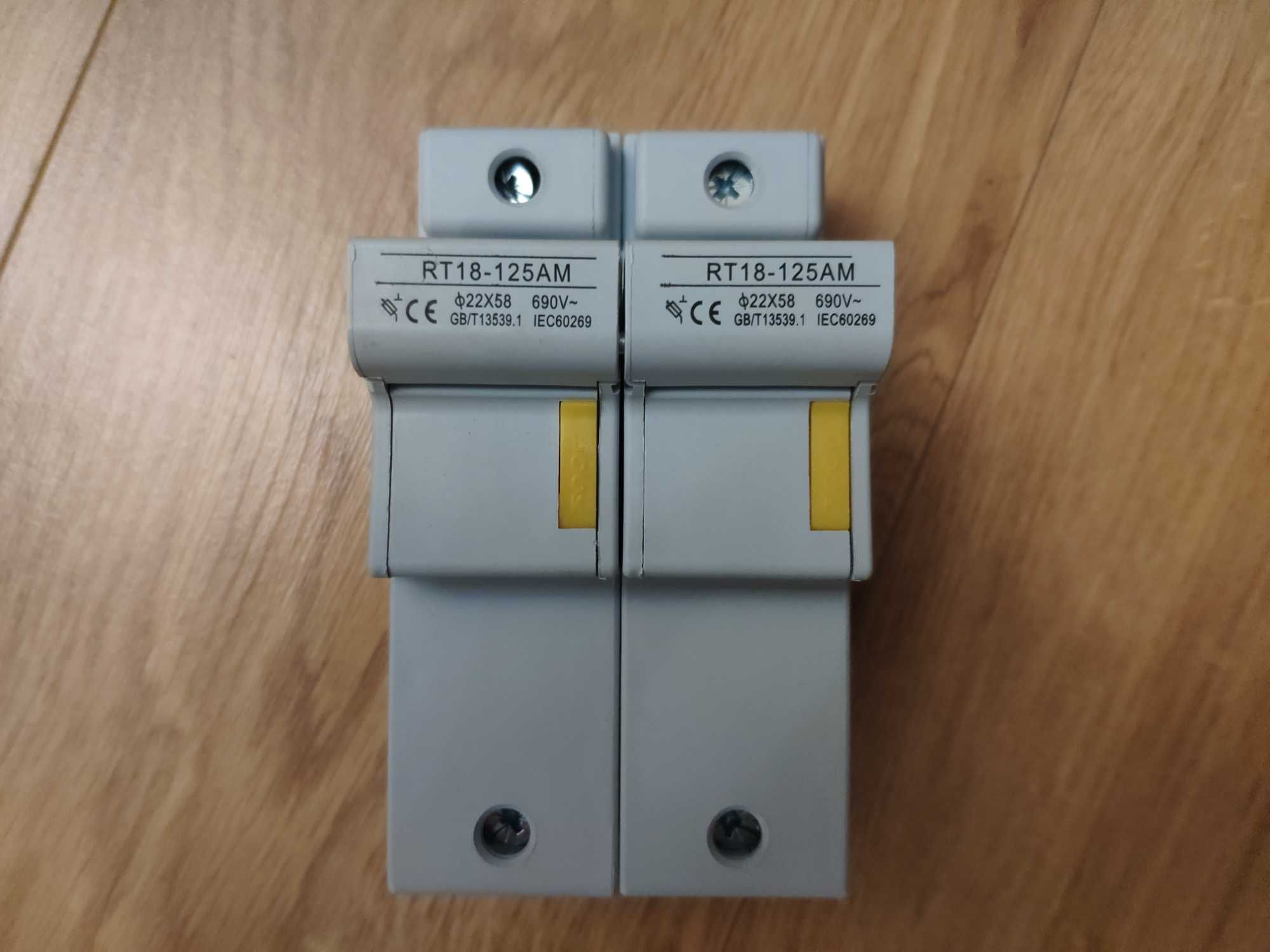 Держатели предохранителей для монтажа на DIN-рейку RT18-125AM D22x58mm