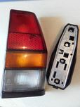 VW Polo II 81-90 Lampa prawa tył z listwą