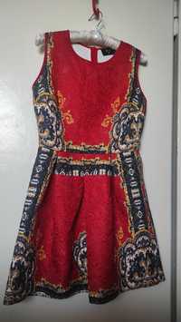 Czerwona sukienka z wzorami elegancka rozkloszowana ax