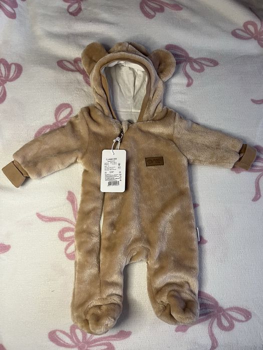 Дитячий утеплений комбінезон- чоловічок з капюшоном.