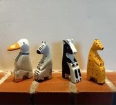 Zestaw 4 sztuk drewnianych figurek zwierzątek.