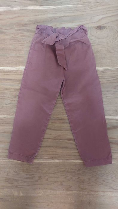 Spodnie dla dziewczynki z kokardą w pasie r. 116 Zara
