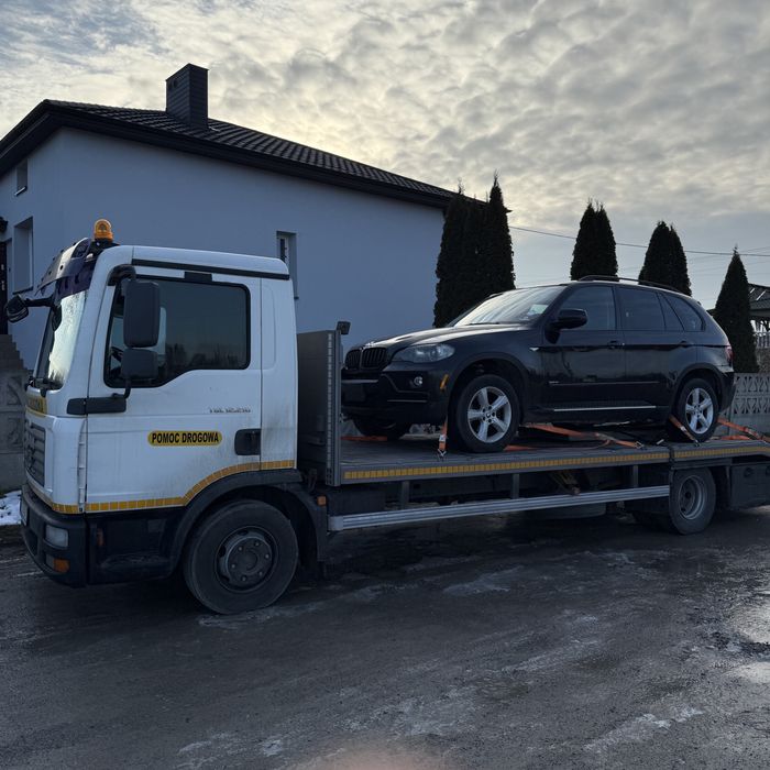 Pomoc drogowa, holowanie, laweta transport maszyn budowlanych rolnicze