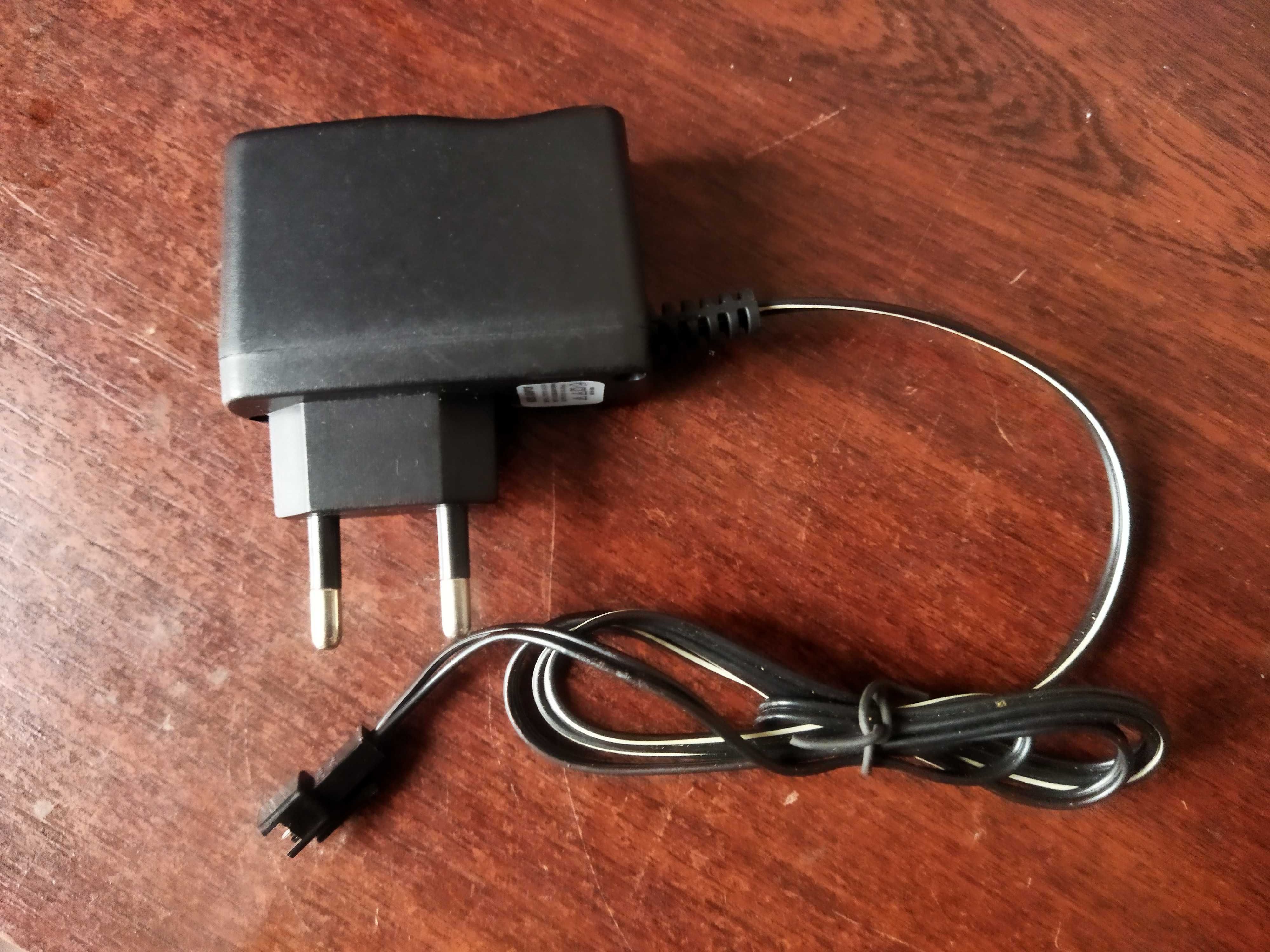 Зарядное устройство AC\DC Adapter 4V 0.2Ah аккумулятора игрушки.