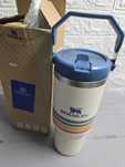 Kubek termiczny kremowo bialy w paski 887 ml stanley