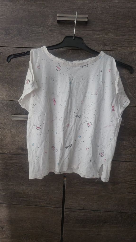 T-shirt z rozcięciami na rękawach dla dziewczynki r. 140