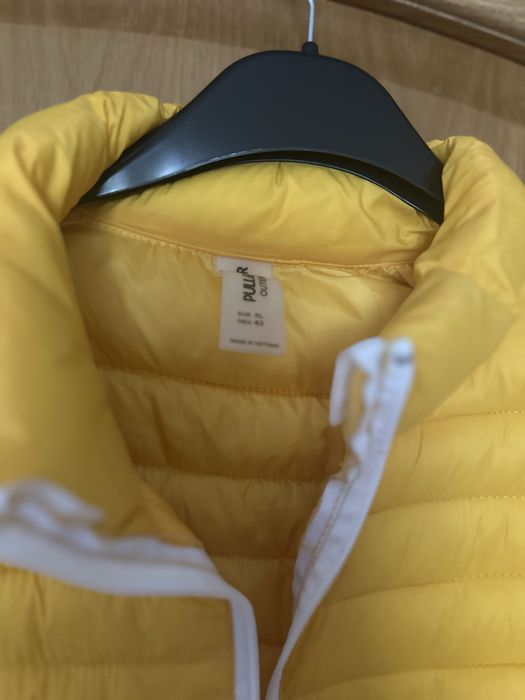 Куртка нова жовтого кольору універсал