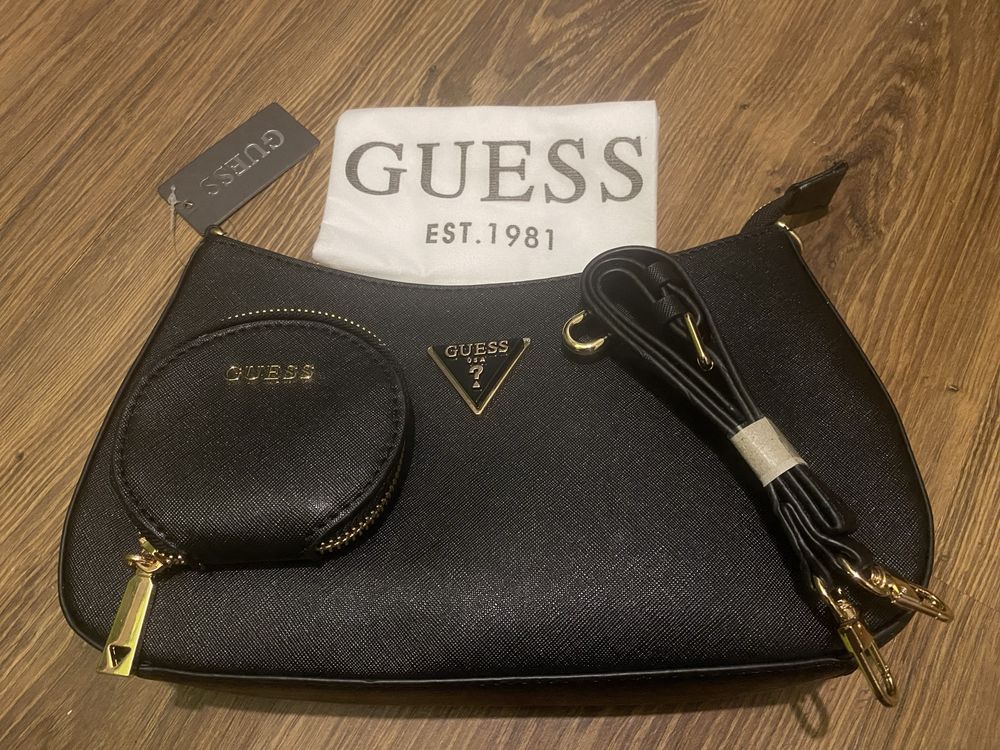 Жіночі сумочки Guess