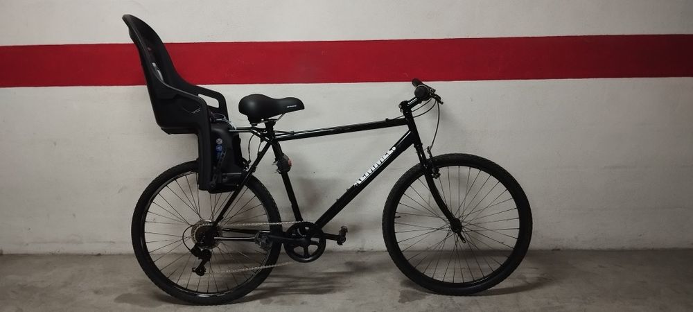 Bicicleta com cadeirinha infantil