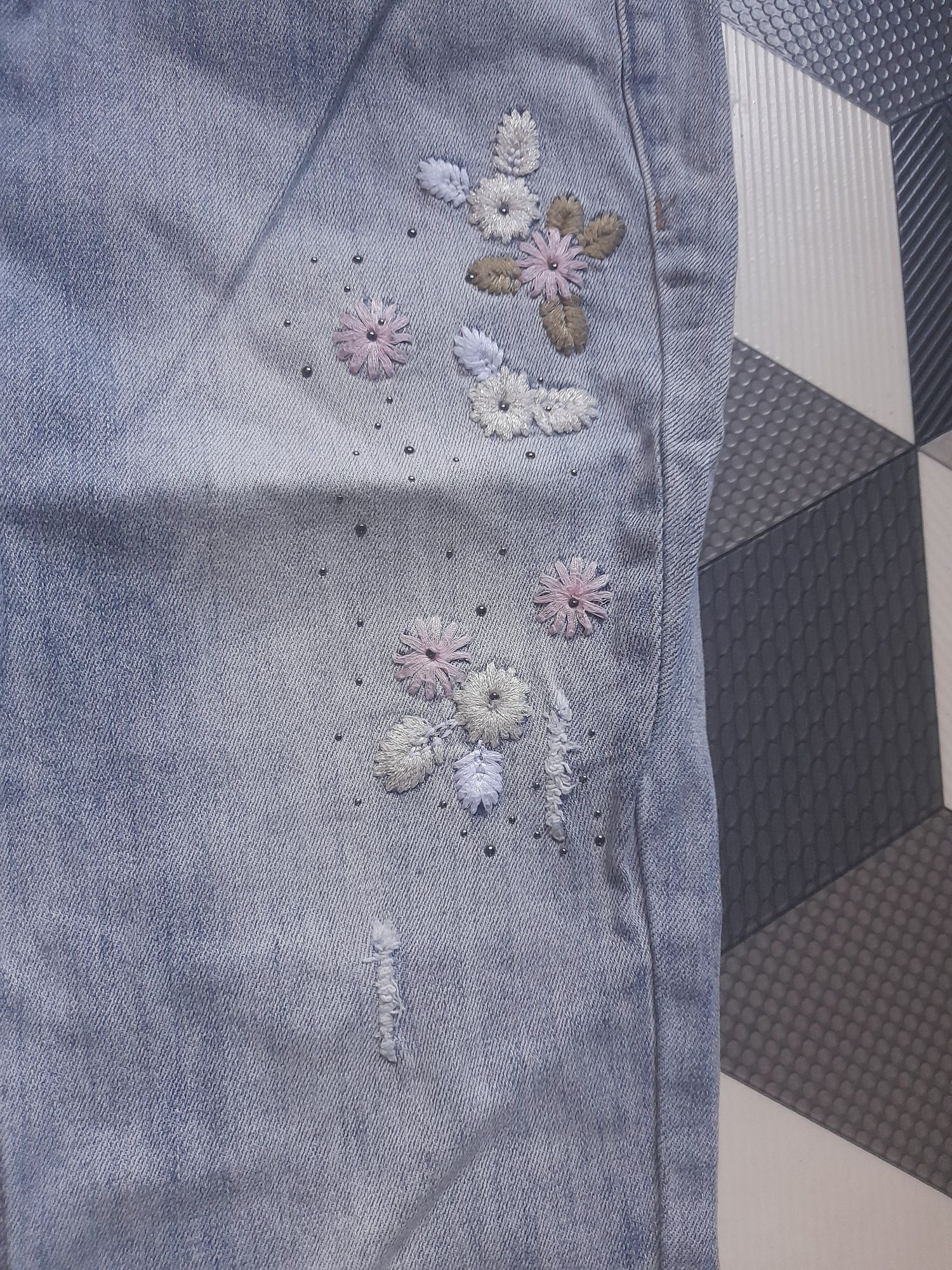 Spodnie jeans kwiaty roz L/xl