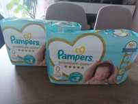 2 paczki nowych pampersow 0
