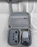 DJI mini 4k + 2 batterias + carregador de bateria + case