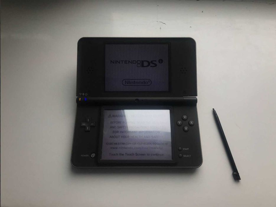 Nintendo DSi xl + 3 частини маріо