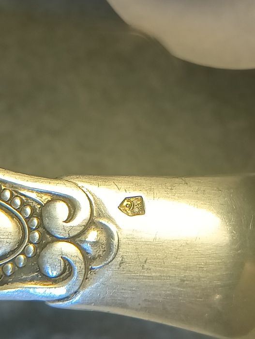 Антикварні срібні щипці для цукру