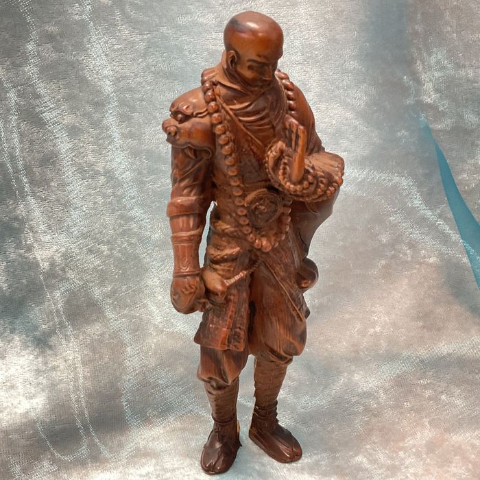 Éscultura de figura madeira exótica