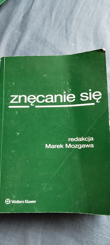 Znęcanie się monografia prawo redakcja Marek Mozgawa Wolters Kluwer