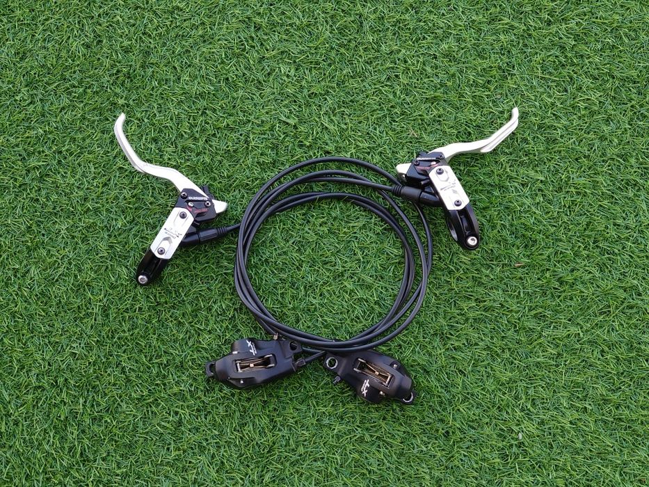 Hamulce hydrauliczne tarczowe Shimano Deore XT M775 komplet P+T