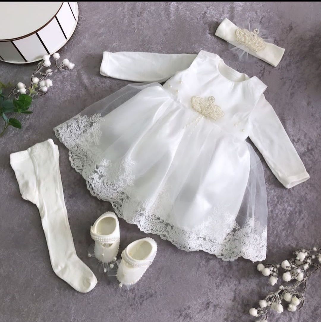 Сукня в ніжно-молочному кольорі на хрещення