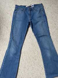 Levi Levis Lewisy dzinsy damskie M 515 boot cut 29/30 calvin klein