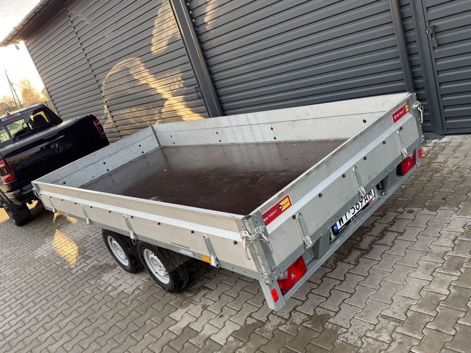 Przyczepa samochodowa STEMA burtowa platforma 2 osie 2.7dmc