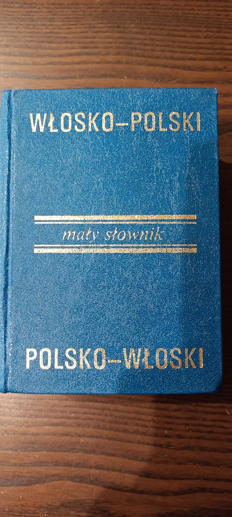 Słowniki włosko - polski, niemiecko - polski.