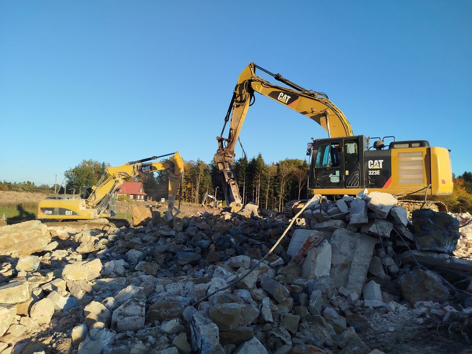 Rozbiórki budynków wyburzenia kucie młotem wynajem koparki