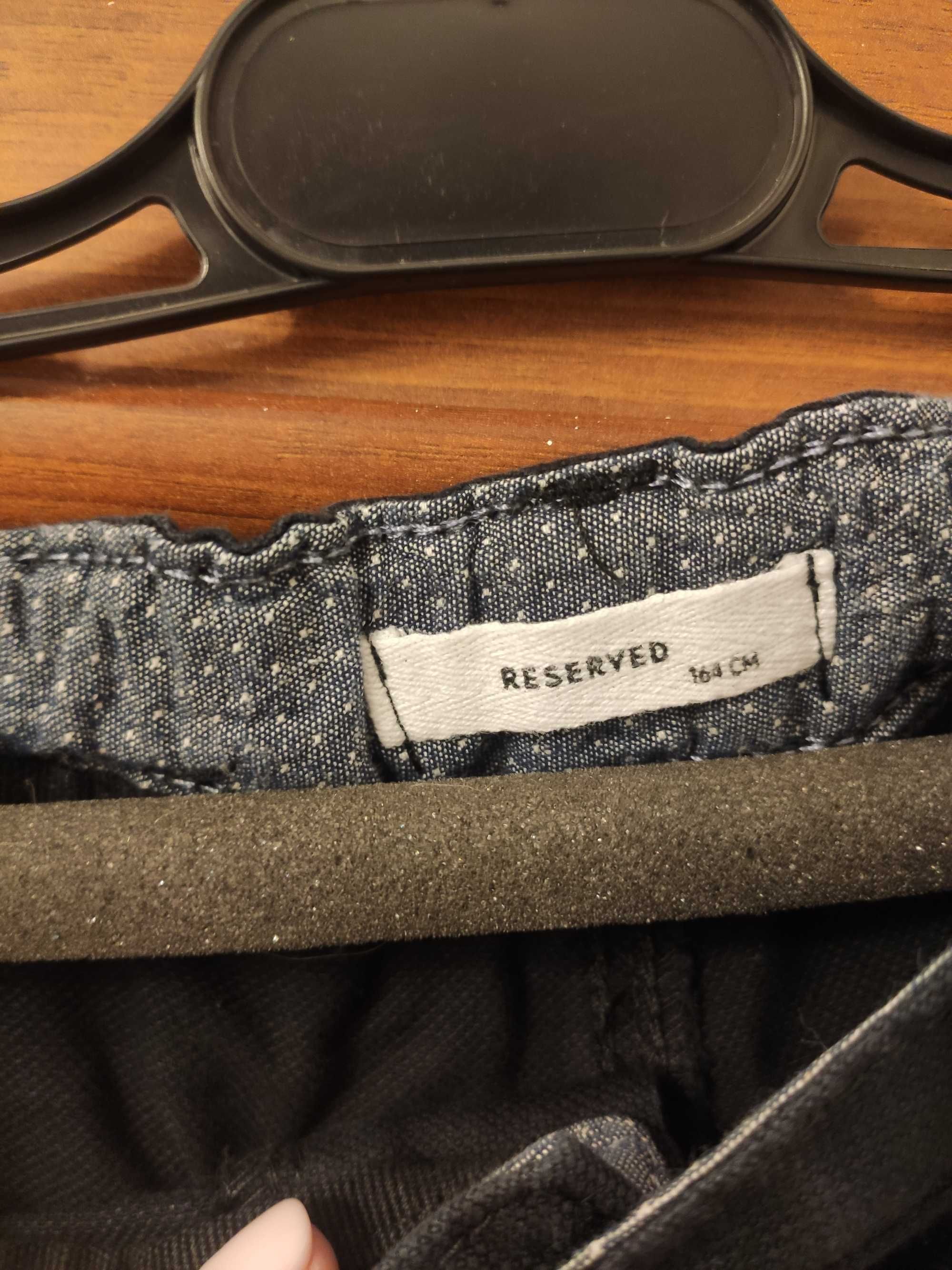 Eleganckie spodnie chłopięce Reserved r. 164