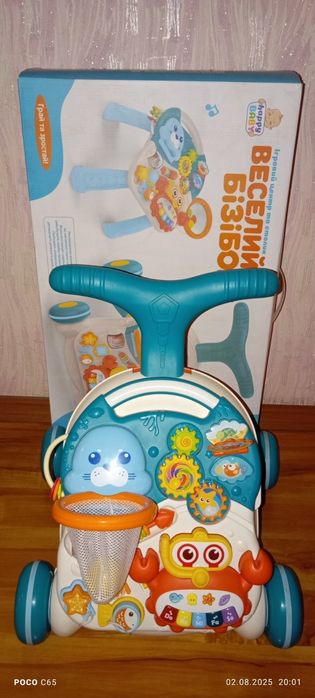 Ходунки каталка,  веселый бизиборд + игровой столик ( 2 в 1 )