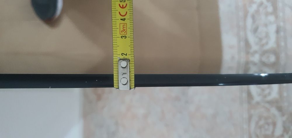 Tampo de mesa em vidro temperado fumê.