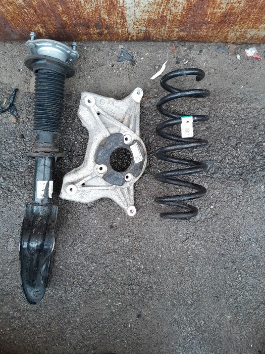 Оригінальна передня права стійка амортизатора Тесла модель Y.