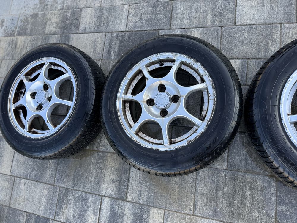 Komplet alufelg Honda Motor (Cromodora) 14” 4×100 z oponami Wielosezon