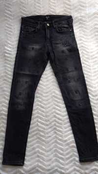 Spodnie Chanel Cc slim fit jeans przetarcia cyrkonie
