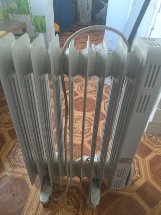 Масленый радиатор