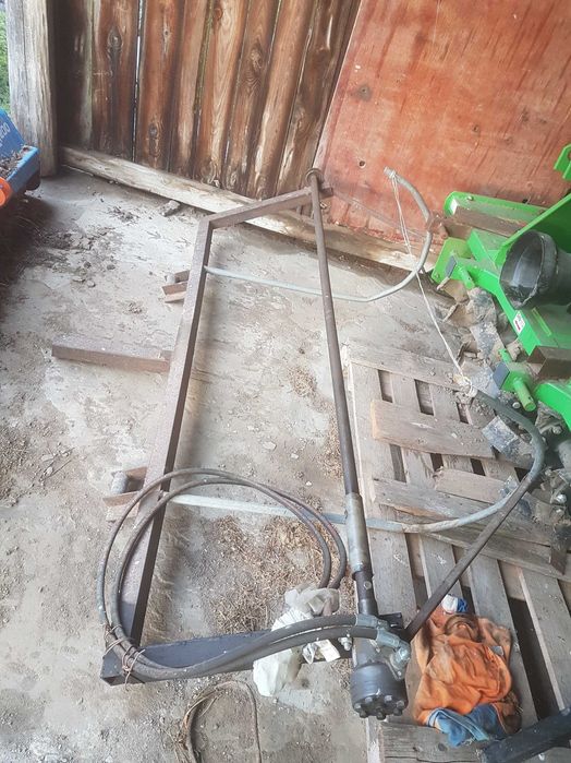 Maszyna do rozkładania i hydrauliczna do zwijania agrowłókniny folii