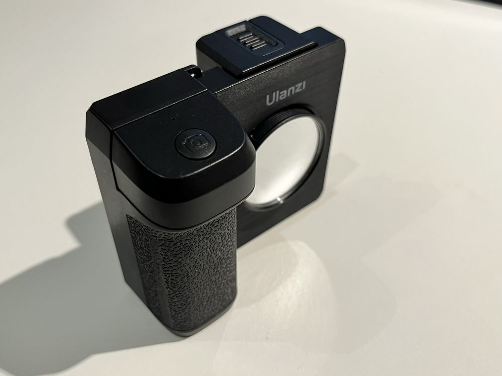 Pega de telemóvel, com controlo Bluetooth